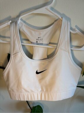 Nike White Dri-FIT Racerback Sports Bra with Black Swoosh